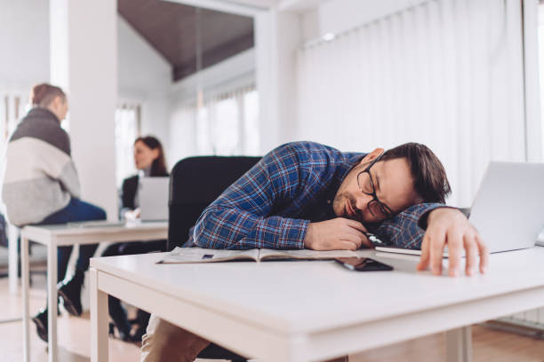 istock Businessman sleeping at the desk 1226829619