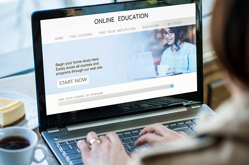 Young girl using online education website