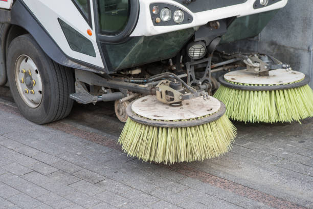 istock car for cleaning streets with rotating round brushes. 1226831325