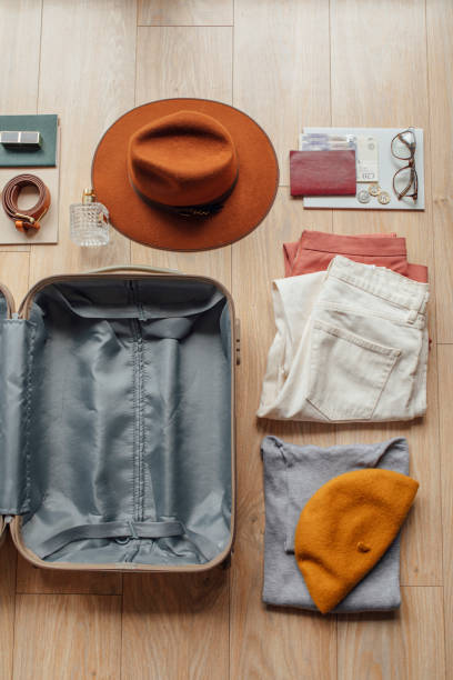 istock Ready to Travel: Clothes and Stuff to be Packed into a Suitcase 1226832433