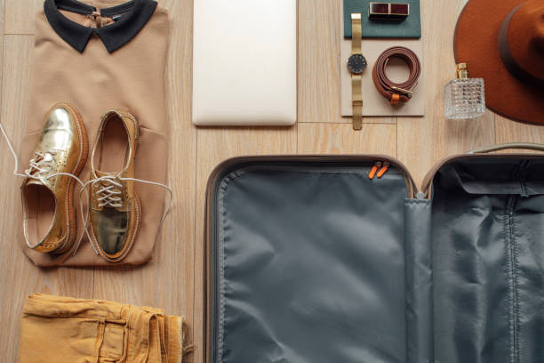 istock Ready to Travel: Clothes and Stuff to be Packed into a Suitcase 1226832436