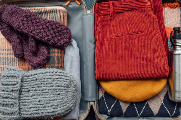 istock Winter Clothes in a Suitcase 1226832444