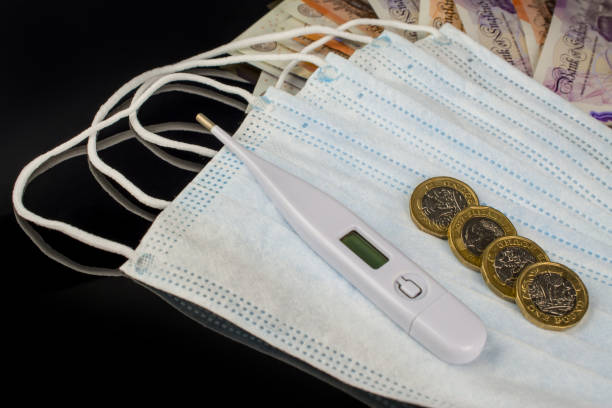 istock UK money face mask  thermometer 1226834313