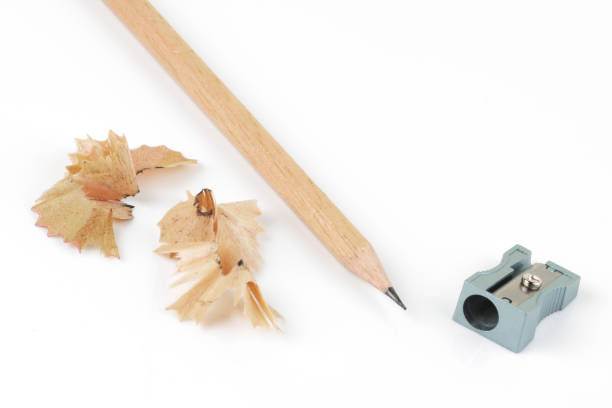 istock Top view of pencil and sharpener with shavings on white 1226838484