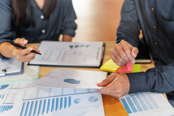 istock Financial auditor meeting analyzing a valuation of investment data. 1226842001