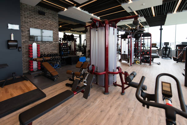 istock Large Modern Gym With Workout Equipment 1226844910