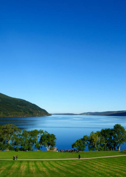The shore of Loch Ness in the Scottish Highlands Loch Ness is a popular tourist attraction in Scotland, best known for the mystery sightings of the Loch Ness monster 'Nessie' drumnadrochit stock pictures, royalty-free photos & images