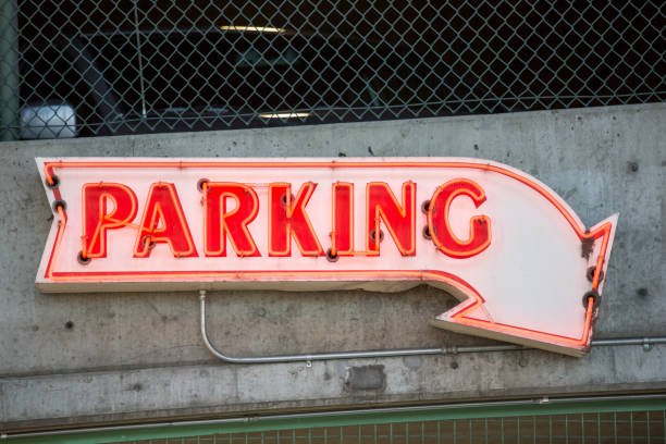 istock Downtown Seattle Parking Sign for Garage in Neon 1226849654