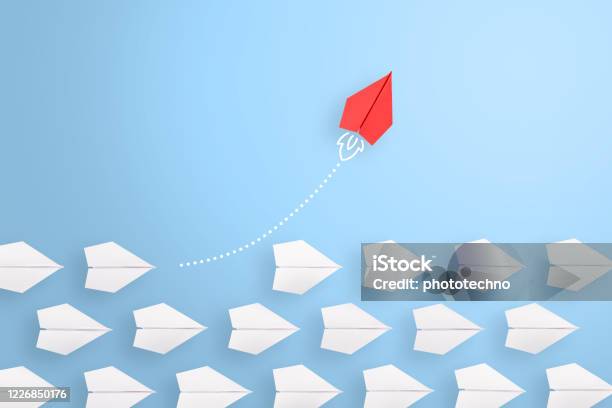 Change Concepts With Red Paper Airplane Leading Among White Stock Photo - Download Image Now