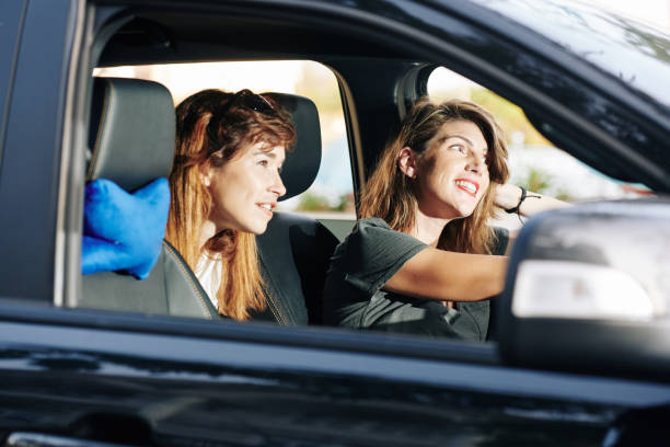 istock Friends enjoying car ride 1226851319