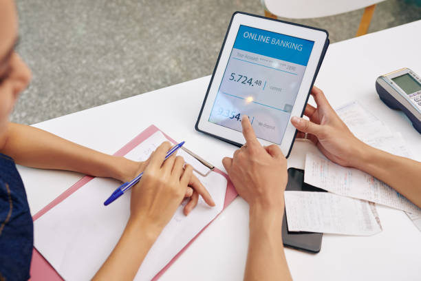 istock Small business owners discussing debt to bank 1226851537