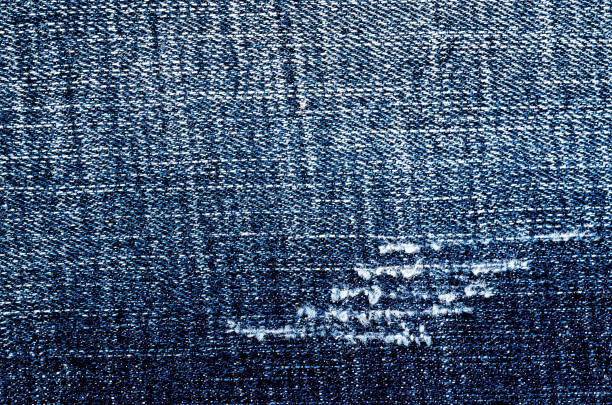 istock Perspective and closeup view to abstract space of empty light blue natural clean denim texture 1226852216