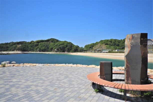 istock Coast next to the promenade and the bench 1226853056
