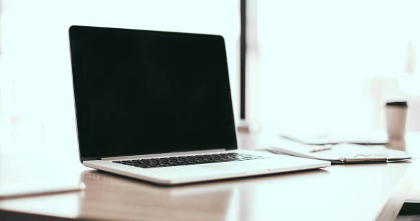 istock close up. open laptop on the office Desk 1226854130