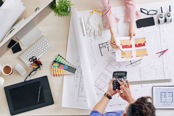 istock Engineers discussing exterior finishing works 1226856024