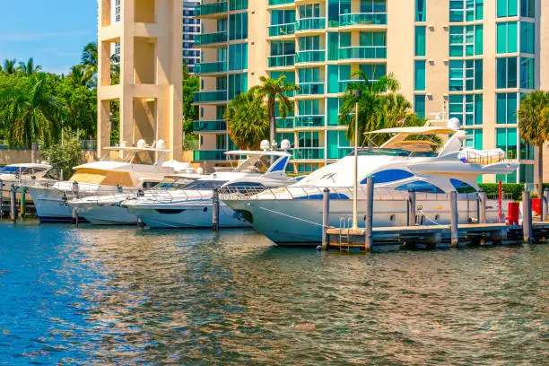 intracoastal docked yatchs view with condo high-rises in florida