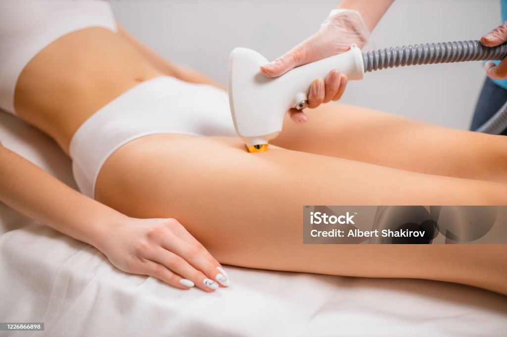 Slim Womans Legs And Apparatus For Laser Hair Removal Stock Photo - Download Image Now - iStock Slim Womans Legs And Apparatus For Laser Hair Removal Stock Photo - Download Image Now - iStock