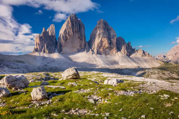 Beautiful Morning at Tre Cime di Lavaredo Mountains with blue sky, Dolomites Alps, Italy