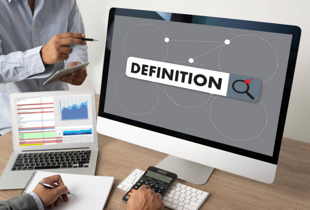 istock DEFINITION Business team hands at work with financial reports and a laptop 1226878140