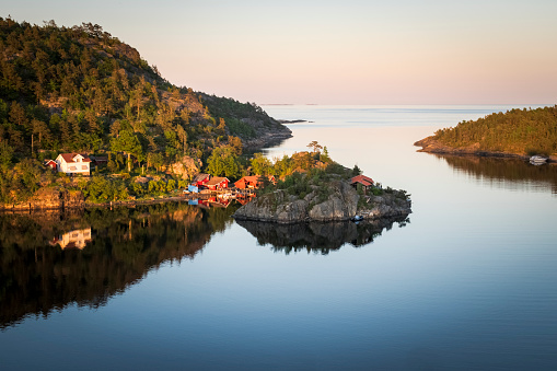 Coastal fishermen houses in a bay of Norway