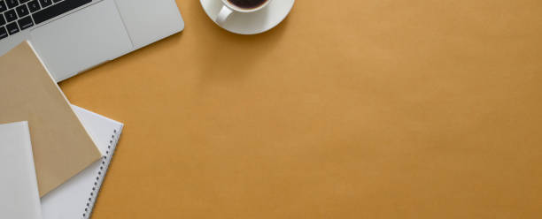 istock Simple workspace with copy space, laptop, notebooks and coffee cup 1226881286