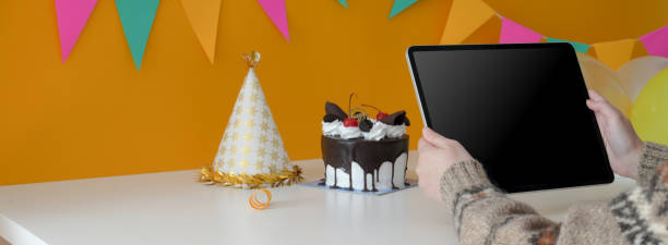 istock Cropped shot of female holding digital tablet while sitting at table 1226881584