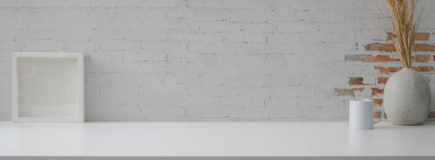 istock Minimal home interior design with copy space, mug, frame and ceramic vase 1226881770