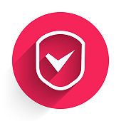 istock White Shield with check mark icon isolated with long shadow. Security, safety, protection, privacy concept. Tick mark approved. Red circle button. Vector Illustration 1226883866