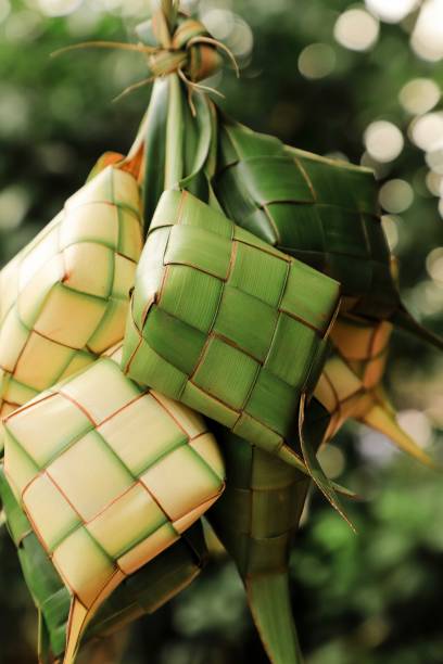 istock Ketupat, the Traditional Rice Cake in Woven Coconut Leaf Casing 1226884205
