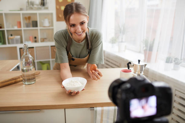 istock Woman shooting a cooking video 1226884226