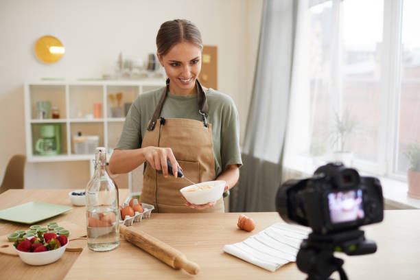 istock Food blogger beating the eggs 1226884286