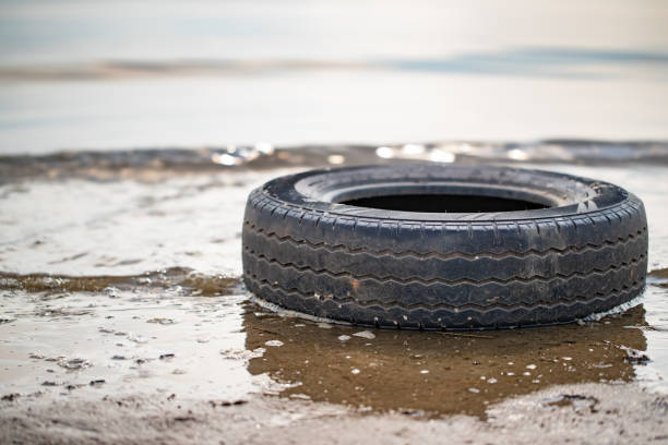 istock Old tires by the sea 1226886380