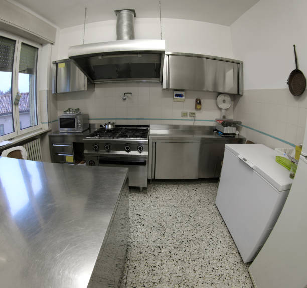 istock industrial kitchen with stainless steel stove and large extracto 1226887816