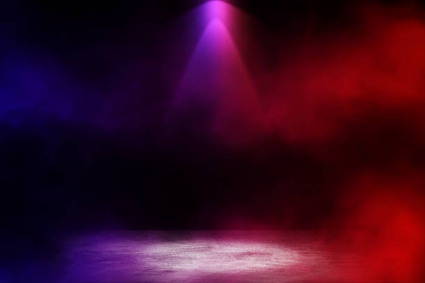 istock Studio dark room with white fog and lighting effect red and blue on concrete floor gradient background for interior decoration. 1226889467