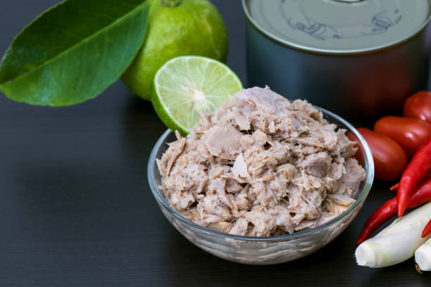 istock Tuna chunks in glass bowl with fresh vegetables. 1226891453