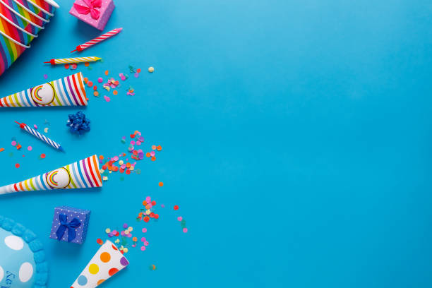 istock flatlay Birthday party card on a blue background with copy space for text 1226893744