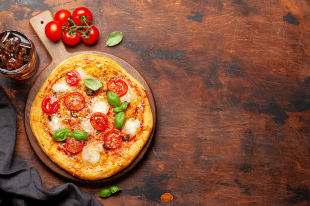 istock Tasty homemade pizza with cola drink 1226896262