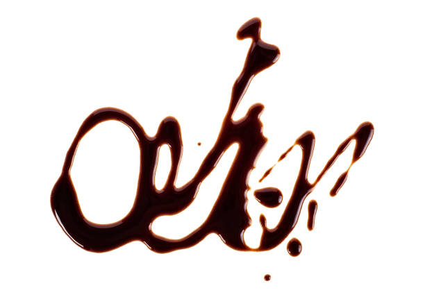 istock Chocolate sauce - abstract pattern made of chocolate isolated on a white background. 1226896868