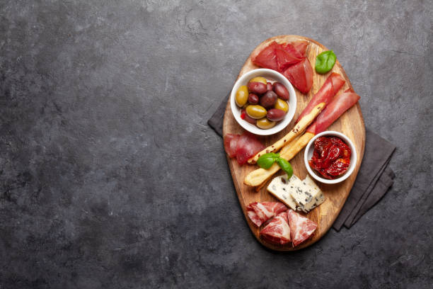 istock Cheese, meat and olives antipasto 1226898036
