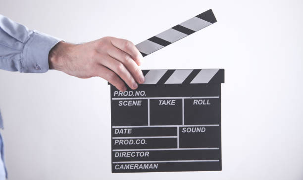 istock Man holding movie clapper. Making movie 1226901219