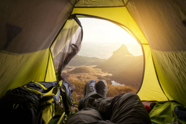 istock A traveler meets dawn in a tent. 1226905594