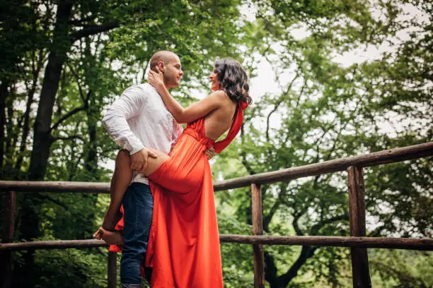 Photo of Young couple dancing with passion