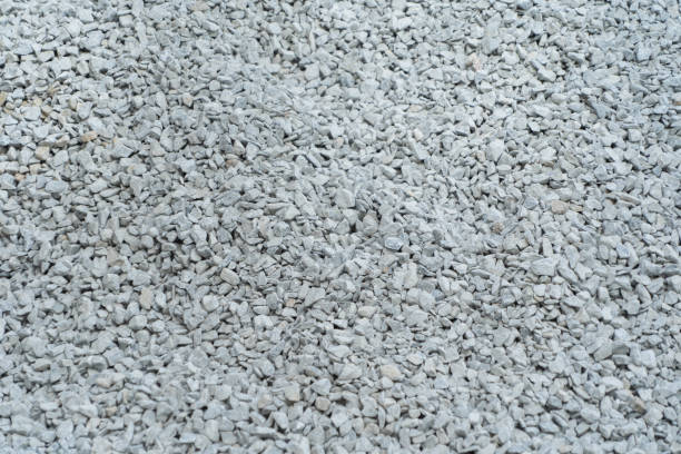 istock White granite gravel stones flooring pattern surface texture. Close-up of exterior material for design decoration background 1226912876