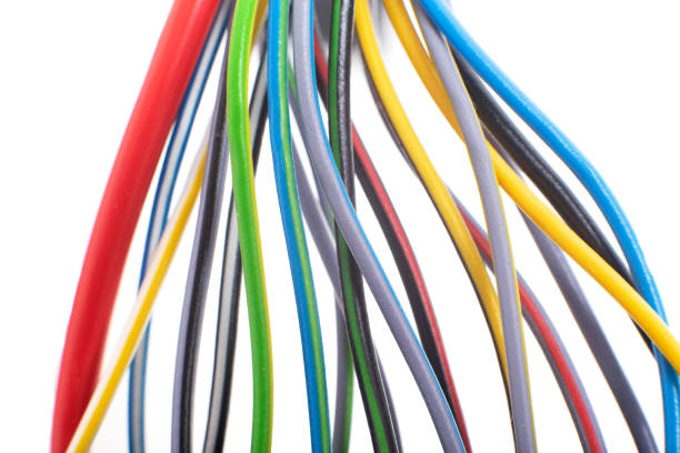 istock A lot of multi-colored electric wires on a white background. Solid wire with color insulation marked plus and minus, anti-short circuit, macro 1226914352