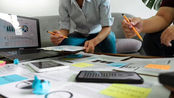 istock Man And Woman Discussing On Table 1226914502