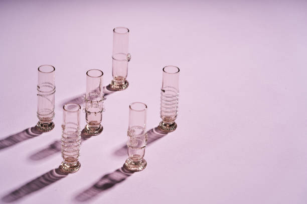 istock Decorative drinking glasses on pastel color background. 1226916963