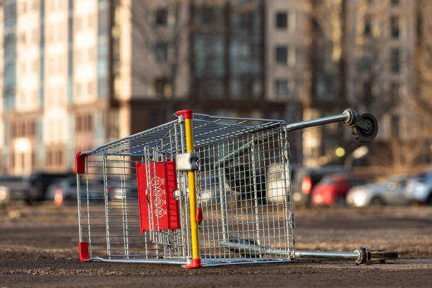 istock Fallen Shopping Cart On Road 1226919839