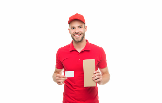 Get your discount card. Happy courier hold card and box. Parcel delivery. Delivery man show blank card for business information. Online shopping. Order and pay with credit card, copy space.