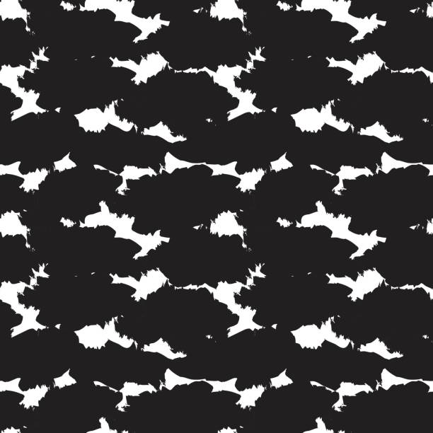 Black and White Camouflage Brush strokes Seamless Pattern Background Black and White camouflage brush strokes seamless pattern background for fashion prints, graphics, backgrounds and crafts black and white cheetah print stock illustrations