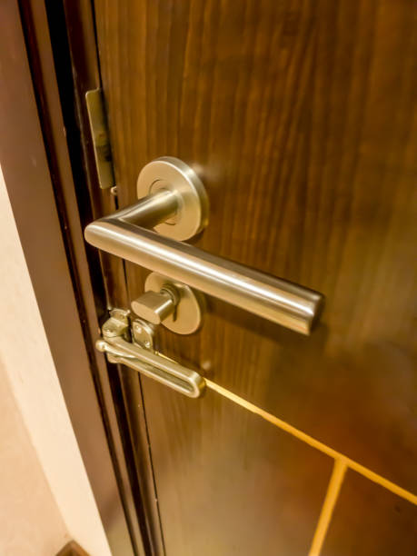 istock Multi-level door lock in the room Silver bolt handle. 1226926182